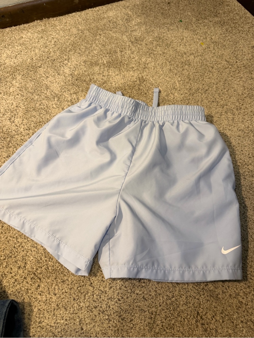 Nike Light Blue Youth Athletic Shorts with White Swoosh